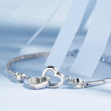 Clamped Hearts Bracelet